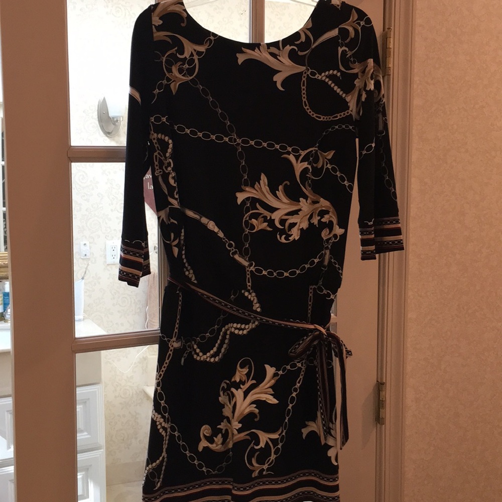 Black long sleeved patterned dress